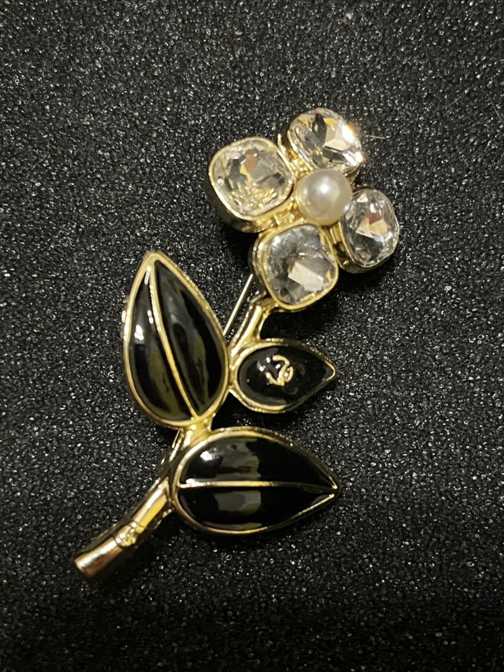 CHANEL Gold-Tone Flower Brooch with Black Enamel and Clear Crystals